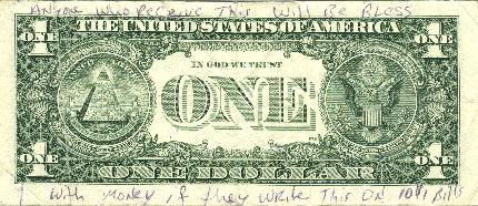 Dollar bill with writing around margin